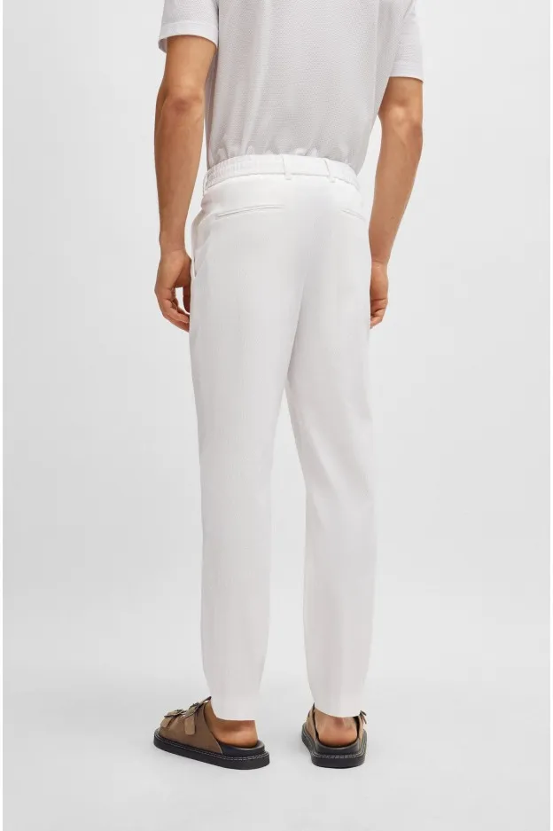 Boss - Hugo Boss Boss - Hugo Boss pantaloni relaxed fit in seersucker di misto cotone