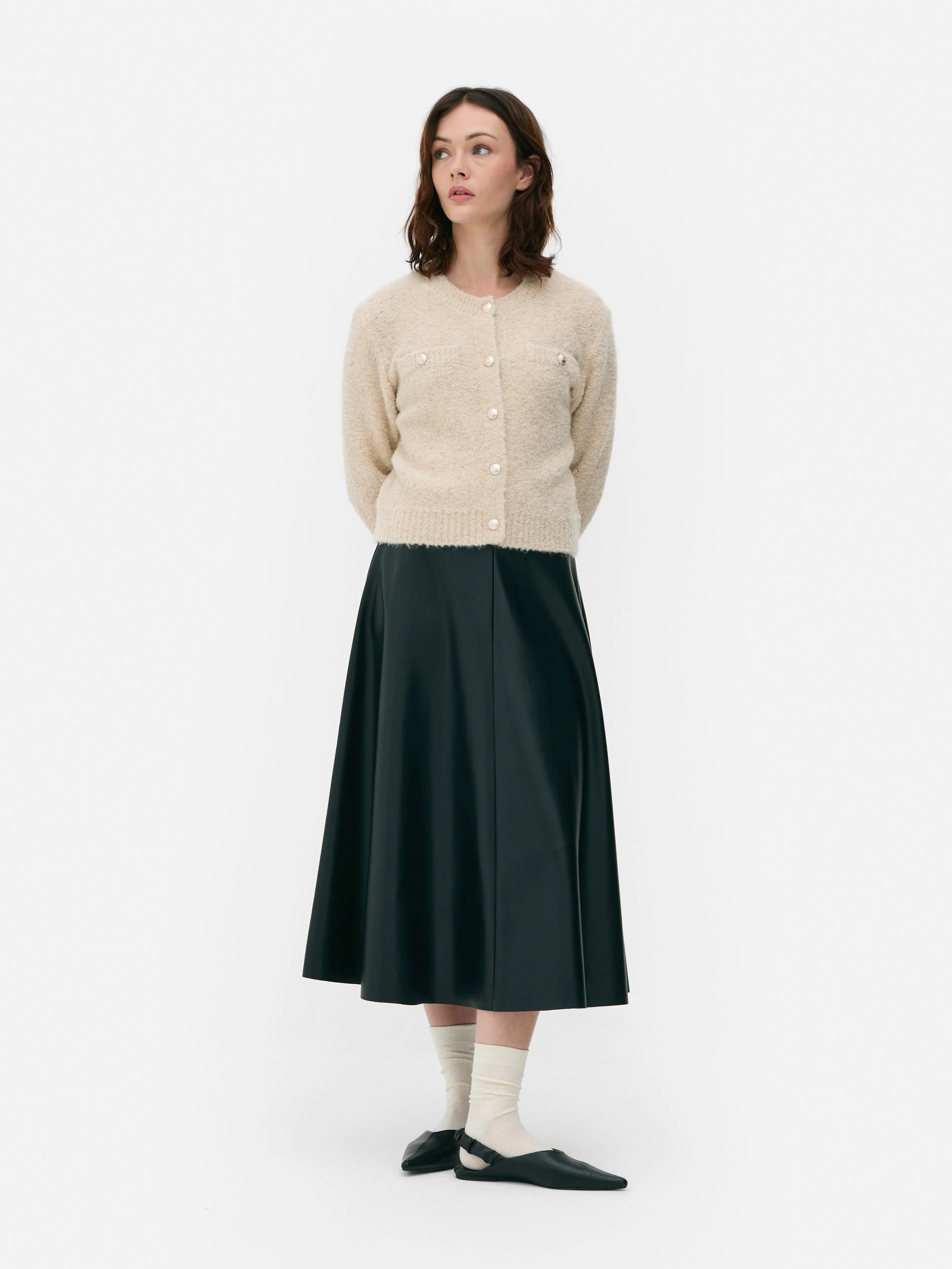Cardigan scintillante con bottoni