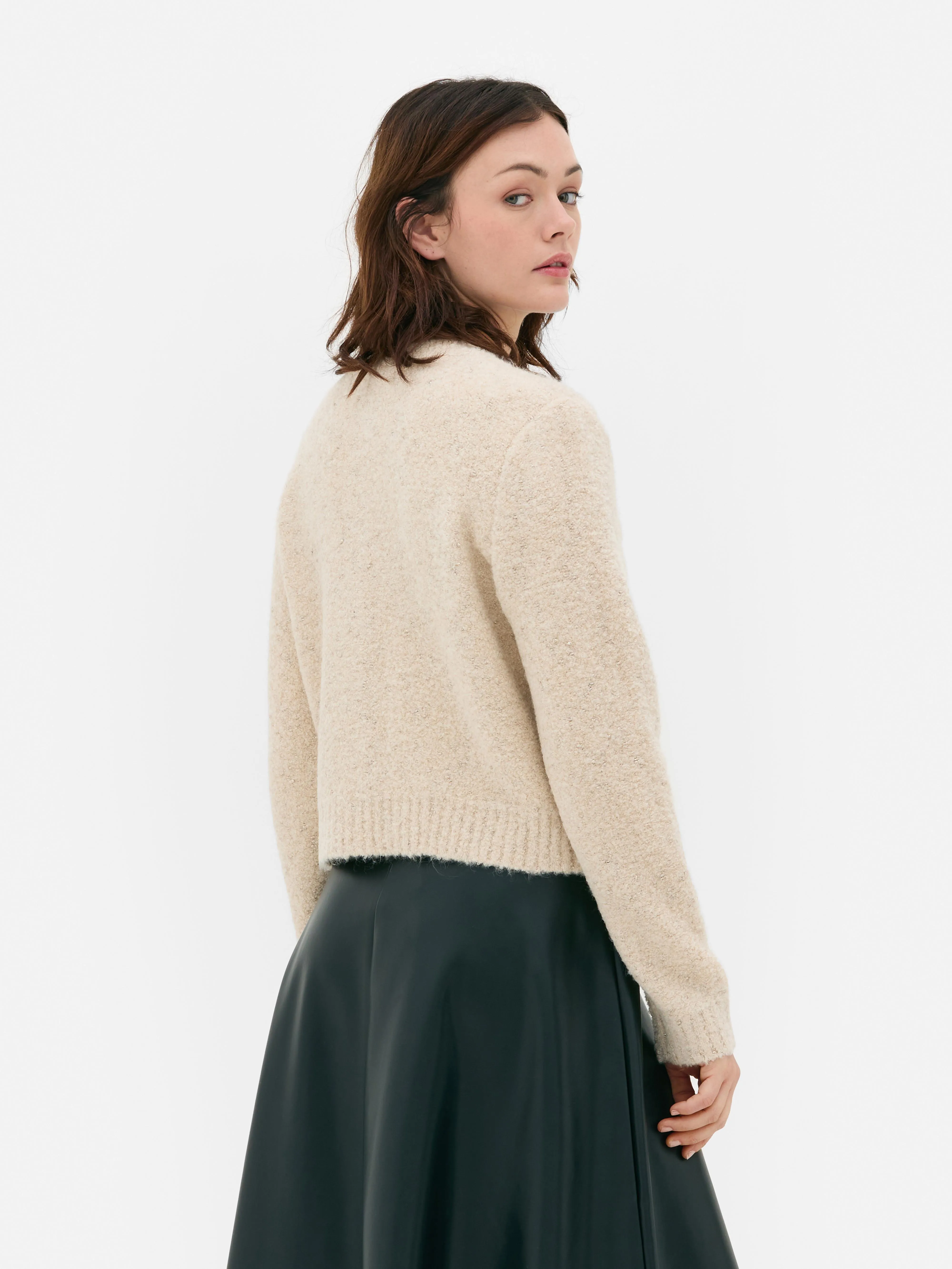Cardigan scintillante con bottoni