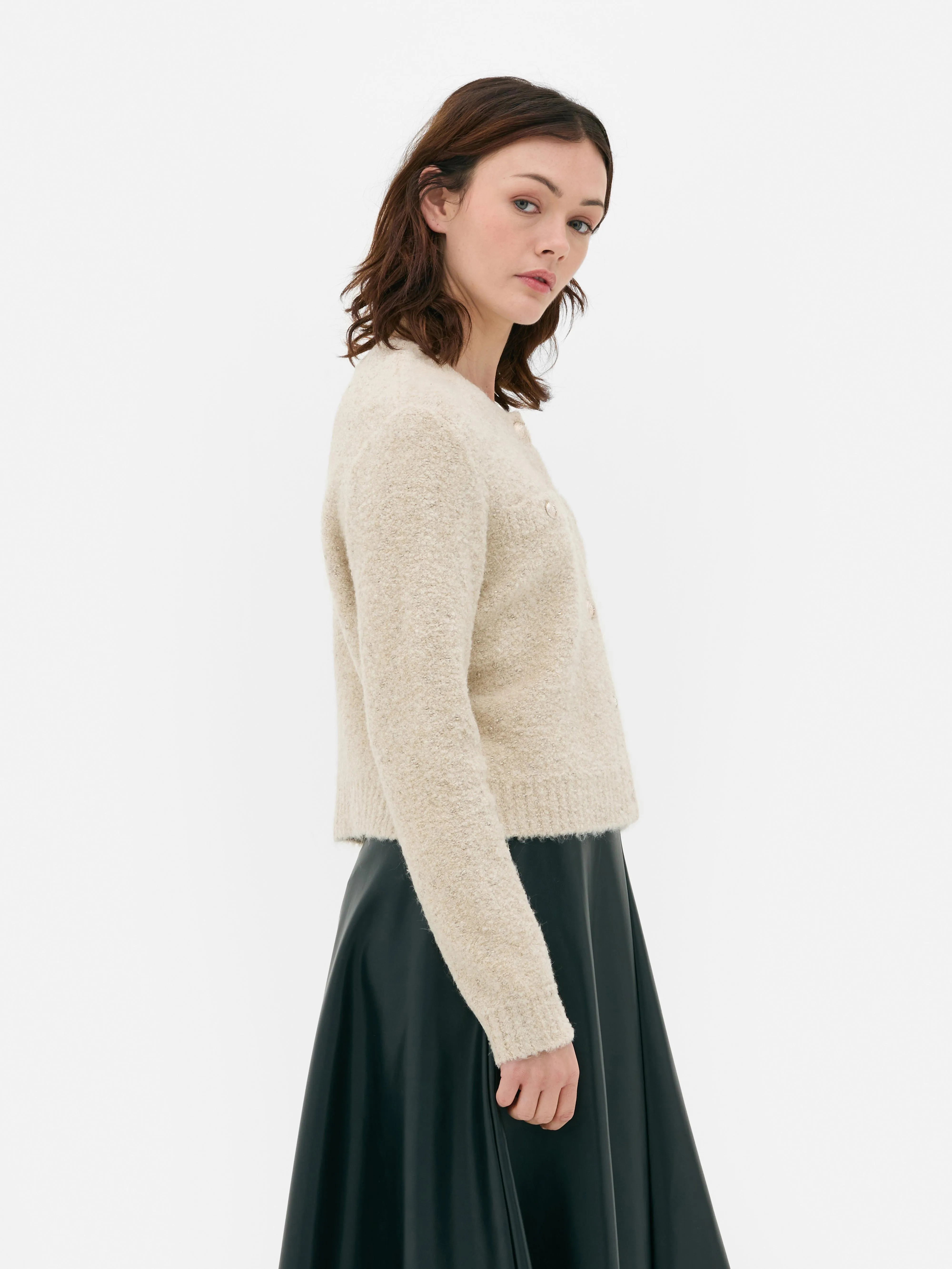Cardigan scintillante con bottoni