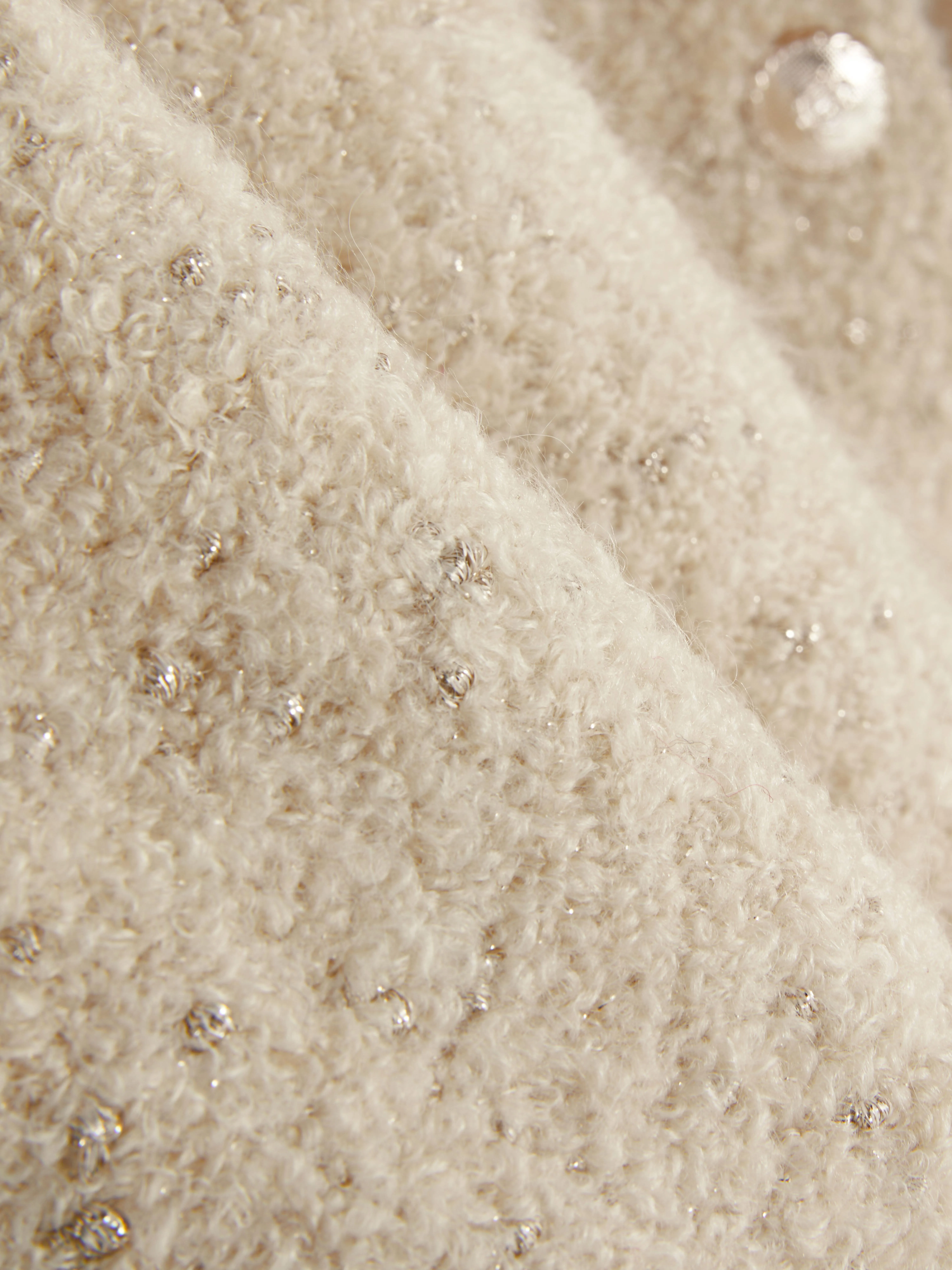 Cardigan scintillante con bottoni