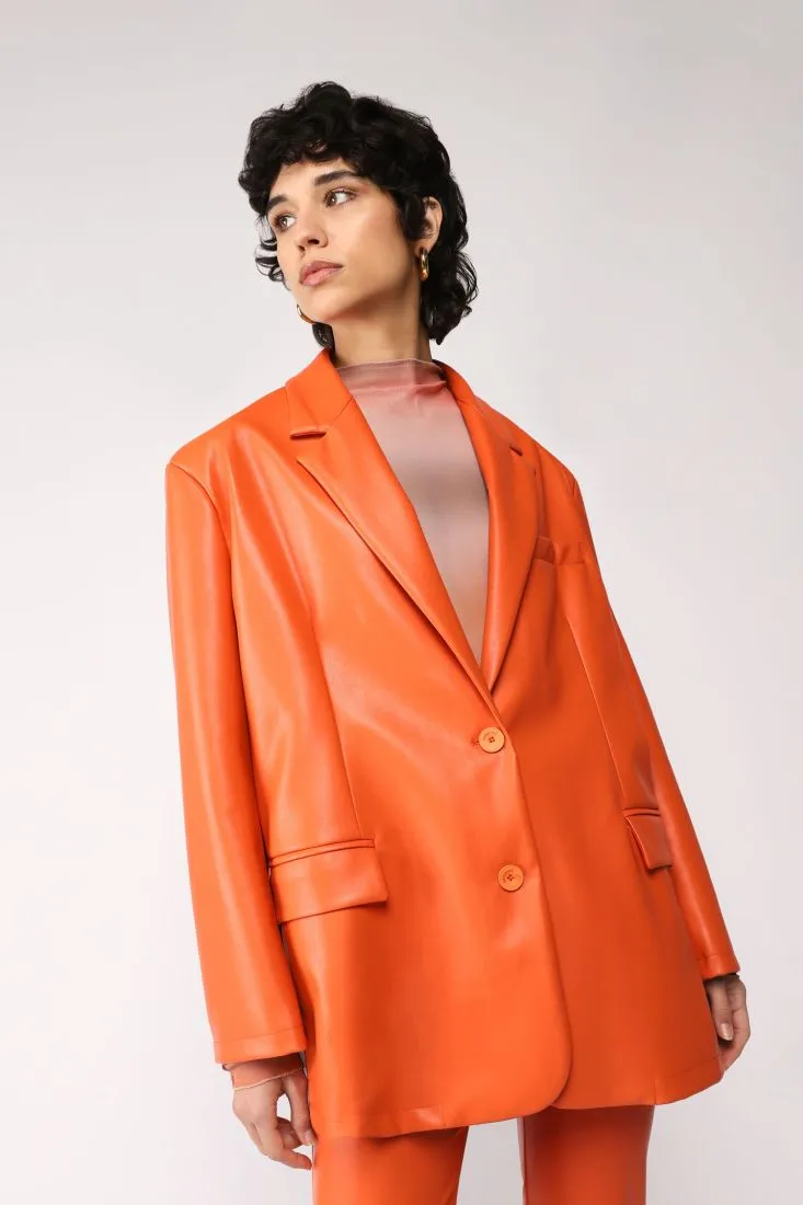Giacca monopetto in similpelle monocolour con revers classici