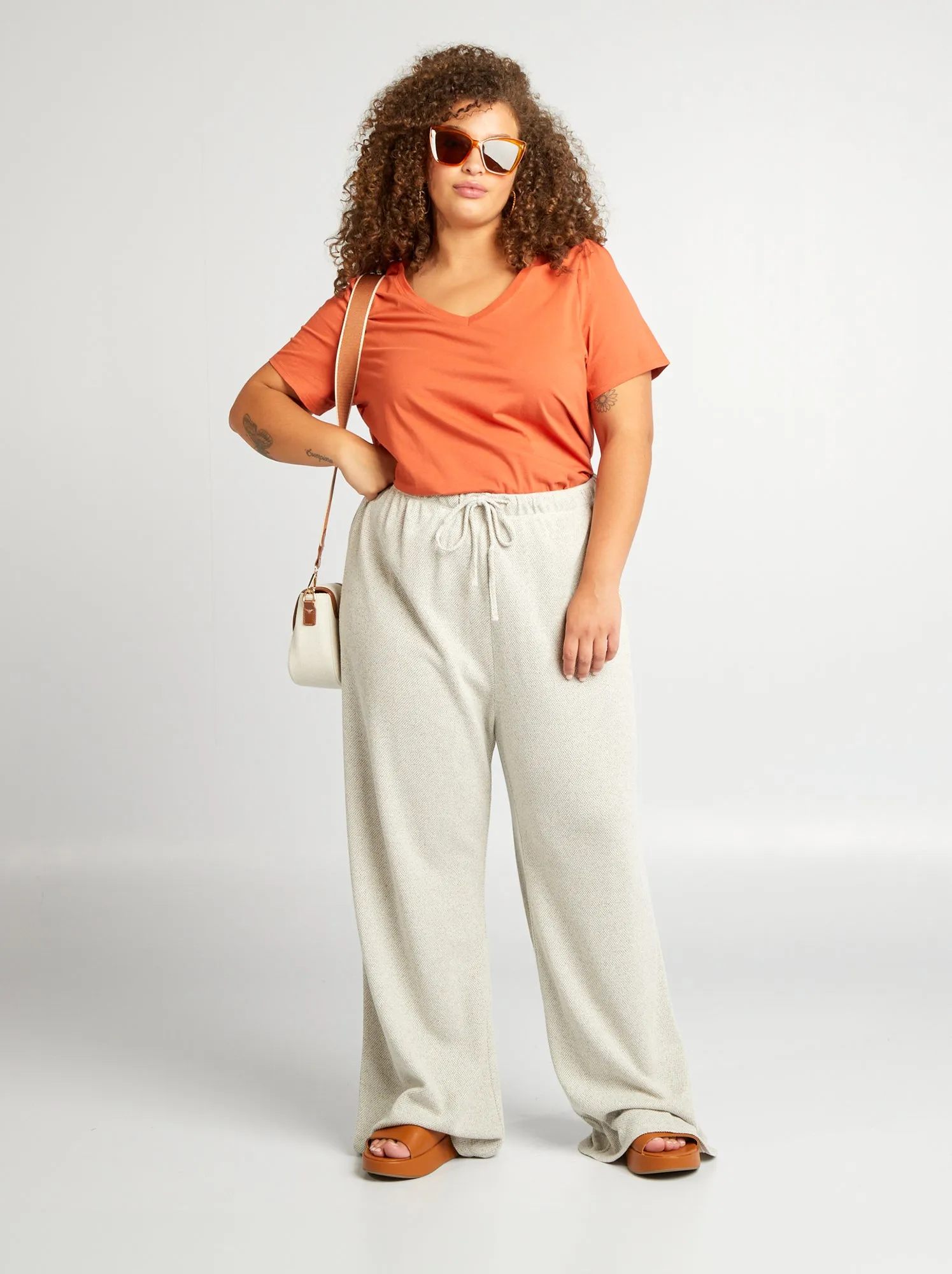 Pantaloni larghi con vita elasticizzata - BEIGE