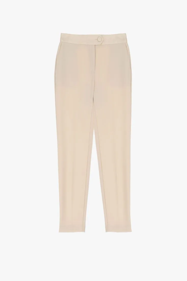 Pantaloni slim-fit monocolour con piega stirata