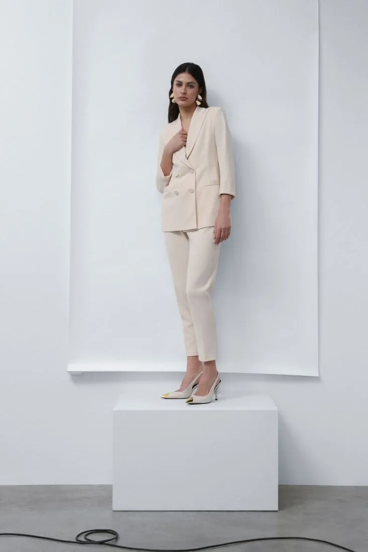 Pantaloni slim-fit monocolour con piega stirata