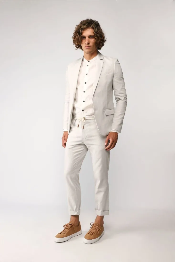 Pantaloni straight monocolour con cordino e orli risvoltati